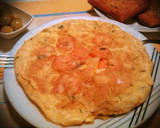 Foto del paso 5 de la receta: Tortilla de langostinos al ajillo