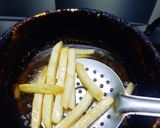 A picture of step 4 of Peri peri fries.