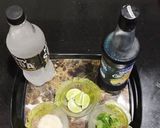 A picture of step 1 of Refreshing blue lagoon mocktail.