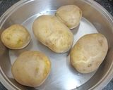 A picture of step 3 of English Jacket Potato Bar with Indian flavours.