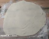 A picture of step 3 of Rumali Roti.