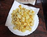 Foto del paso 4 de la receta: Cochino frito con papas y champiñones