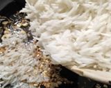 A picture of step 8 of Garlic rice.