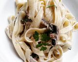 A picture of step 6 of Tagliatelle with Cream and Mushrooms.