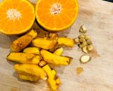 A picture of step 1 of Turmeric orange juice.