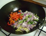 A picture of step 1 of Scrambled Eggs with Bell Peppers.