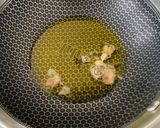 A picture of step 4 of Vasant Panchami Kesar Chawal (Yellow Sweet Rice).