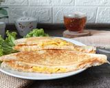 Foto langkah ke 4 dari resep Egg Melt Sandwich.