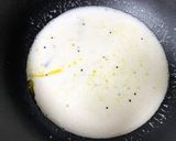 A picture of step 3 of Ilish Macher Malai Curry (Hilsa Fish in Coconut milk gravy) Bengali lunch.