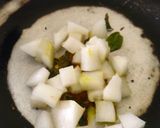 A picture of step 3 of Ash gourd Thoran.