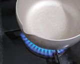 A picture of step 2 of Delicious, Easy, Foolproof Flan.