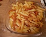 Foto del paso 4 de la receta: Patatas fritas con bacon y quesos