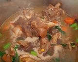 A picture of step 3 of Soup with beef bones and soup mix.