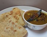 A picture of step 4 of Chana veg with paratha.