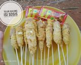 Foto langkah ke 3 dari resep Telur gulung isi sosis.