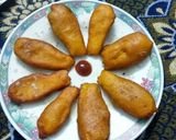 A picture of step 5 of Crispy baiguni with a twist(brinjal fritters).