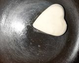 A picture of step 3 of Souffle pancakes (heart shaped).