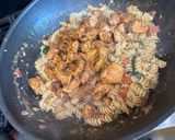 A picture of step 5 of Creamy Garlic Chicken Pasta with Tomato Spinach & Mushrooms.
