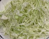 A picture of step 1 of Coleslaw with raisins.