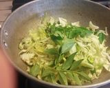 A picture of step 3 of Stir fried Cabbage, green peas, bok choy stuffed Pita bread.