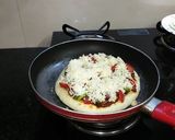 A picture of step 10 of Pan Pizza with paneer stuffing without yeast.