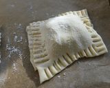 A picture of step 2 of Sweet potato with dhania and spinach and onion puff pastry's baked in the Cookswell jiko.