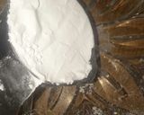 A picture of step 3 of Vanilla tutti fruity cake with Mango topping.
