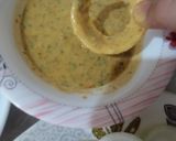 A picture of step 3 of Cheetos onion rings fritters.