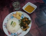 A picture of step 9 of Kumro shaak with chingri mach and dal a tasty lunch.