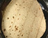 A picture of step 6 of Omelette-roti sandwich.