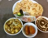 A picture of step 17 of Dal Makhani,paneer -butter masala,tandoori parathas.
