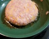 A picture of step 2 of Four Meat, Four Cheese Bagel Breakfast Sandwich.