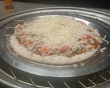 A picture of step 3 of Veg pizza.