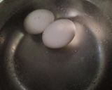 A picture of step 2 of Egg chicken sandwich with YUMMy Tea.