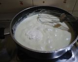 A picture of step 5 of Spinach Alfredo pizza (homemade base).