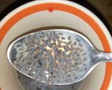 A picture of step 1 of 3 colour Jame shiri drink.