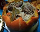 A picture of step 14 of Pumpkin stuffed rice.