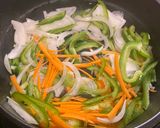 A picture of step 3 of Japchae - Korean vermicelli with meat and vegetables.