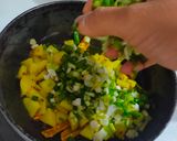 A picture of step 2 of Spring onion potato stir-fry.