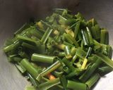 A picture of step 3 of Onion Flower Stalks dry Curry.