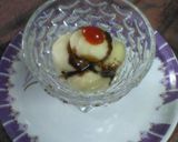 A picture of step 5 of Rasgolla with choco sauce.