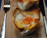 A picture of step 10 of Eggs in bread basket.