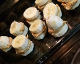 A picture of step 2 of Chocolate Covered Frozen Banana Peanut Butter Sandwiches.