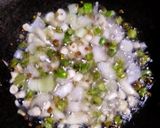 A picture of step 2 of Spring onion fried rice.