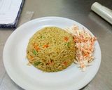 A picture of step 8 of Jollof Rice with coslow.