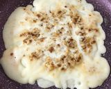 A picture of step 7 of Coconut Jaggery Stuffed Pancakes.