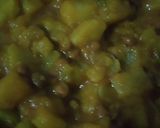 A picture of step 4 of Green papaya with black chana and potatoes.