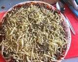 A picture of step 7 of Tuna pizza.