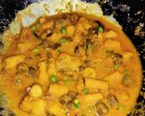 A picture of step 9 of Mushroom Baby Corn Curry.