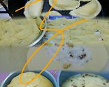 A picture of step 2 of Hyderabadi Kheer Puris/Coconut and Mixed Nuts Calzones.